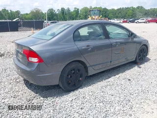 2011 Honda Civic LX with VIN 19XFA1F52BE045256, listed as a IAAI auction lot 42170028 with 222,168 mi miles and . Bid and sale history available at DreamBid. Image 4.