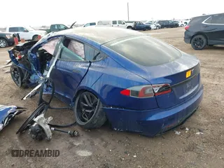 2021 Tesla Model S Long Range with VIN 5YJSA1E50MF432224, listed as a IAAI auction lot 41417130 with Not provided miles and . Bid and sale history available at DreamBid. Image 3.