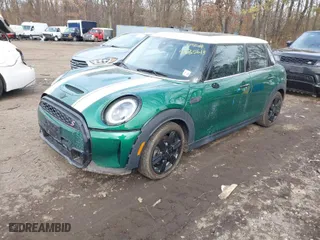 2022 MINI Hardtop 4 Door Cooper S with VIN WMW53DK07N2S44464, listed as a IAAI auction lot 41635613 with 28,303 mi miles. Bid and sale history available at carsss.com. Image 2.