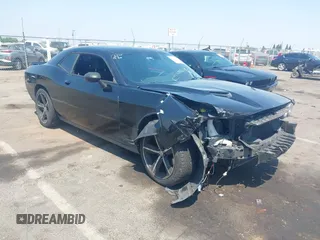 2016 Dodge Challenger SXT with VIN 2C3CDZAG7GH129140, listed as a IAAI auction lot 42723671 with 149,407 mi miles and . Bid and sale history available at DreamBid. Image 1.