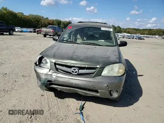 2002 Mazda Tribute LX with VIN 4F2YU09122KM62196, listed as a Copart auction lot 77327034 with 256,385 mi miles and Salvage Title. Bid and sale history available at carsss.com. Image 11.