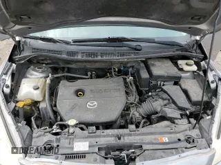 2015 Mazda 5 Sport z VIN JM1CW2BL2F0179147, wystawiony jako Copart lot #54125515 z przebiegiem 94 294 mil mil oraz Szkoda całkowita • Salvage title. Historia ofert i sprzedaży dostępna na DreamBid. Obrazek 12.
