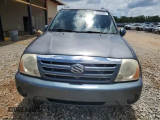 2005 Suzuki XL7 LX z VIN JS3TY92VX54102488, wystawiony jako Copart lot #56700595 z przebiegiem 169 827 mil mil oraz Szkody całkowita. Historia ofert i sprzedaży dostępna na DreamBid. Obrazek 5.