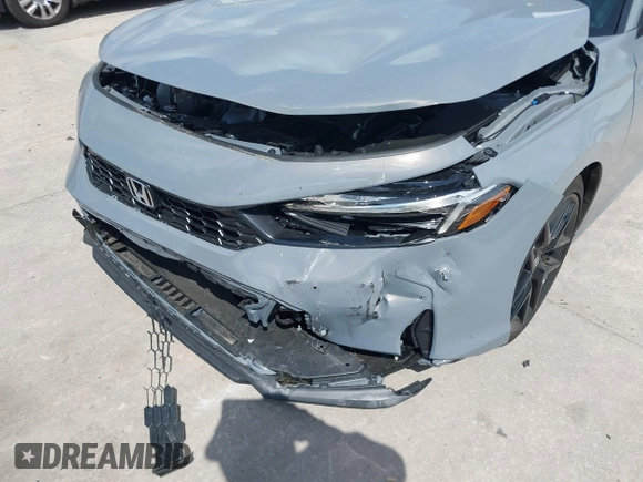 2025 Honda Civic Sport with VIN 2HGFE2F57SH571849, listed as a IAAI auction lot 41902538 with 869 mi miles and . Bid and sale history available at DreamBid. Image 6.