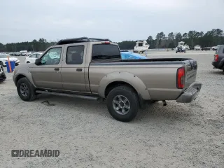 2004 Nissan Frontier XE with VIN 1N6ED29X64C478172, listed as a Copart auction lot 49031985 with 210,354 mi miles and Salvage title. Bid and sale history available at DreamBid. Image 2.