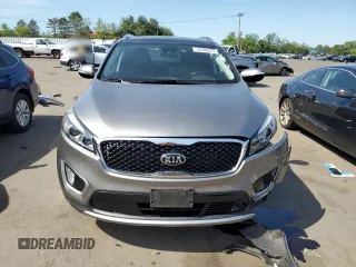 2017 Kia Sorento EX z VIN 5XYPHDA56HG232245, wystawiony jako Copart lot #56305625 z przebiegiem 76 947 mil mil oraz Szkoda całkowita • Salvage title. Historia ofert i sprzedaży dostępna na DreamBid. Obrazek 5.
