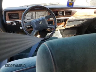1988 Mercury Grand Marquis GS z VIN 2MEBM74F1JX664779, wystawiony jako Copart lot #76826594 z przebiegiem Nie podano mil oraz Szkody całkowita. Historia ofert i sprzedaży dostępna na DreamBid. Obrazek 8.