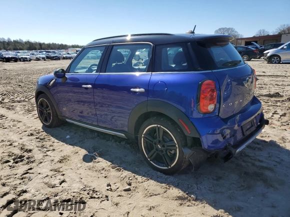 2016 MINI Countryman S with VIN WMWZC5C56GWP49473, listed as a Copart auction lot 50752355 with 118,060 mi miles and Salvage Title. Bid and sale history available at DreamBid. Image 2.