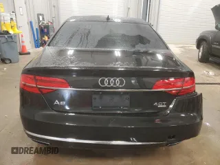 2015 Audi A8 4.0T z VIN WAUJ2AFD5FN009882, wystawiony jako Copart lot #84222704 z przebiegiem 56 118 mil mil oraz Czysty tytuł • Clean title. Historia ofert i sprzedaży dostępna na DreamBid. Obrazek 6.