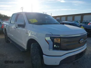2022 Ford F-150 Lightning Pro with VIN 1FTVW1EV4NWG04301, listed as a IAAI auction lot 41821787 with 38,417 mi miles and . Bid and sale history available at DreamBid. Image 14.