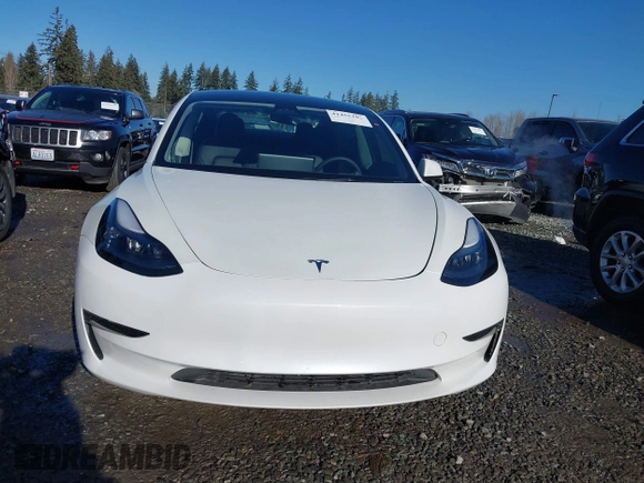 2023 Tesla Model 3 z VIN 5YJ3E1EA0PF611244, wystawiony jako IAAI lot #41455102 z przebiegiem 21 867 mil mil oraz . Historia ofert i sprzedaży dostępna na DreamBid. Obrazek 13.