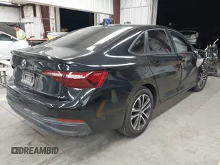 2022 Volkswagen Jetta Sport with VIN 3VWBM7BU9NM006080, listed as a IAAI auction lot 42433645 with Not provided miles and . Bid and sale history available at DreamBid. Image 4.