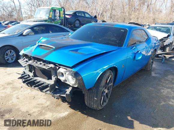 2019 Dodge Challenger R/T Scat Pack Widebody z VIN 2C3CDZFJ0KH552252, wystawiony jako IAAI lot #41662399 z przebiegiem 63 337 mil mil oraz . Historia ofert i sprzedaży dostępna na DreamBid. Obrazek 18.