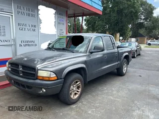 2003 Dodge Dakota Sport с VIN 1D7HL38N83S151291, выставлен на аукционе Copart как лот 60267175 с пробегом 162 785 миль миль и Чистый • Clean title. История ставок и продаж доступна на DreamBid. Изображение 2.