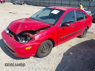 2000 Ford Focus LX with VIN 1FAFP33PXYW413249, listed as a IAAI auction lot 42561661 with 253,875 mi miles and . Bid and sale history available at DreamBid. Image 17.
