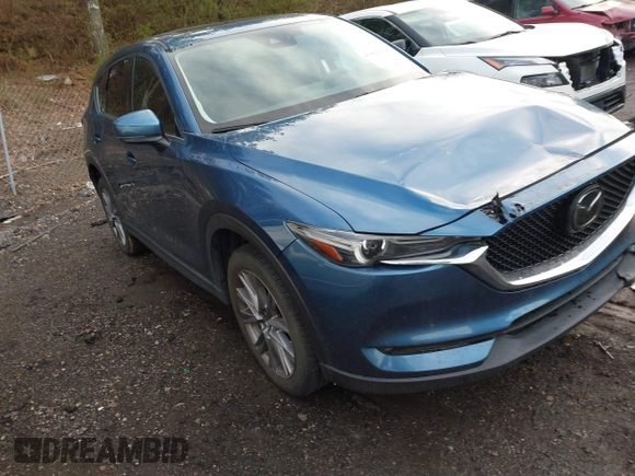 2020 Mazda CX-5 Grand Touring with VIN JM3KFADM4L0827733, listed as a IAAI auction lot 41482517 with 43,597 mi miles. Bid and sale history available at carsss.com. Image 1.