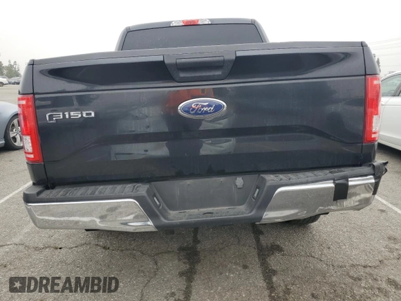 2015 Ford F-150 XL with VIN 1FTEW1CG0FKD03070, listed as a Copart auction lot 52990475 with 102,844 mi miles and Salvage title. Bid and sale history available at DreamBid. Image 6.