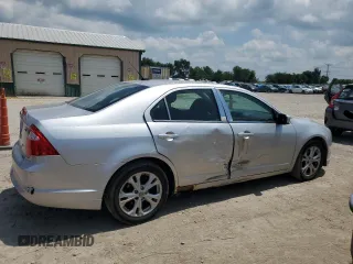 2012 Ford Fusion SE with VIN 3FAHP0HA1CR146333, listed as a Copart auction lot 61265935 with 158,480 mi miles and Salvage title. Bid and sale history available at DreamBid. Image 3.