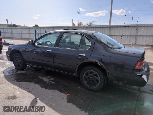 1997 Nissan Maxima GXE with VIN JN1CA21D0VT201140, listed as a Copart auction lot 52230495 with 286,440 mi miles and Clean title. Bid and sale history available at DreamBid. Image 2.