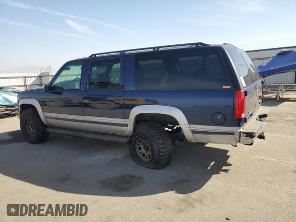 1997 GMC Suburban z VIN 1GKFK16R6VJ758513, wystawiony jako Copart lot #75034574 z przebiegiem 181 873 mil mil oraz Szkoda całkowita • Salvage title. Historia ofert i sprzedaży dostępna na DreamBid. Obrazek 2.