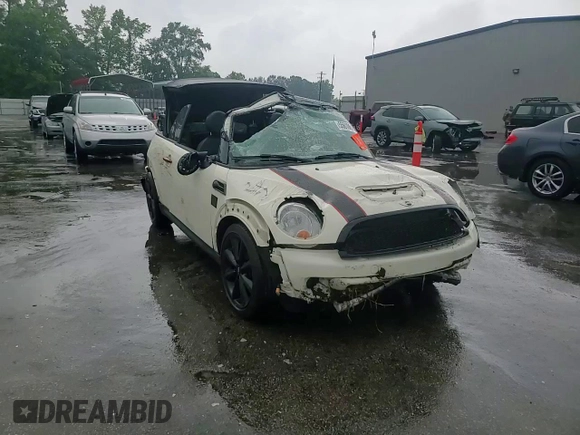 2014 MINI Convertible S с VIN WMWZP3C5XET706231, выставлен на аукционе Copart как лот 55610615 с пробегом 70 416 миль миль и Списание • Salvage title. История ставок и продаж доступна на DreamBid. Изображение 13.