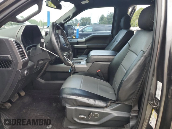 2015 Ford F-150 XLT with VIN 1FTEW1EG8FFC03207, listed as a Copart auction lot 59690515 with 261,153 mi miles and Salvage title. Bid and sale history available at DreamBid. Image 7.