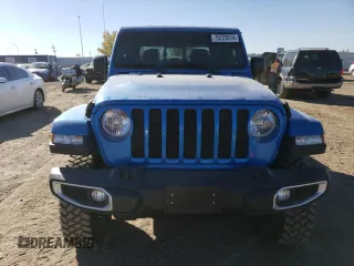 2022 Jeep Gladiator Willys with VIN 1C6JJTAM3NL132056, listed as a Copart auction lot 75723014 with 36,195 mi miles and Salvage title. Bid and sale history available at DreamBid. Image 5.