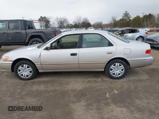 2001 Toyota Camry CE with VIN 4T1BG22K51U046766, listed as a IAAI auction lot 41674202 with 148,581 mi miles. Bid and sale history available at carsss.com. Image 14.