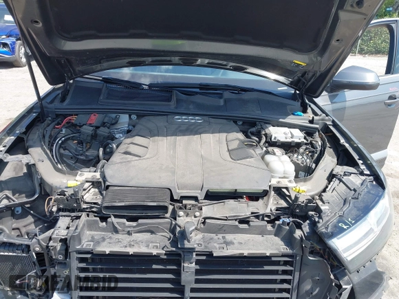 2019 Audi Q7 Premium Plus z VIN WA1LAAF70KD020498, wystawiony jako IAAI lot #41976990 z przebiegiem 91 643 mil mil oraz . Historia ofert i sprzedaży dostępna na DreamBid. Obrazek 10.
