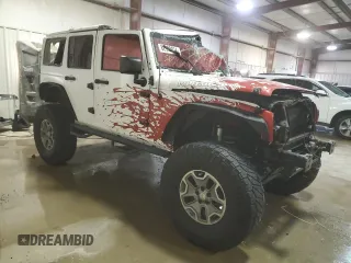2017 Jeep Wrangler Unlimited Rubicon Recon with VIN 1C4BJWFG3HL577788, listed as a Copart auction lot 82932034 with 142,752 mi miles and Salvage title. Bid and sale history available at DreamBid. Image 4.