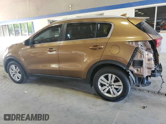 2017 Kia Sportage LX with VIN KNDPMCAC9H7157171, listed as a Copart auction lot 54885905 with 194,496 mi miles and Salvage Title. Bid and sale history available at DreamBid. Image 2.