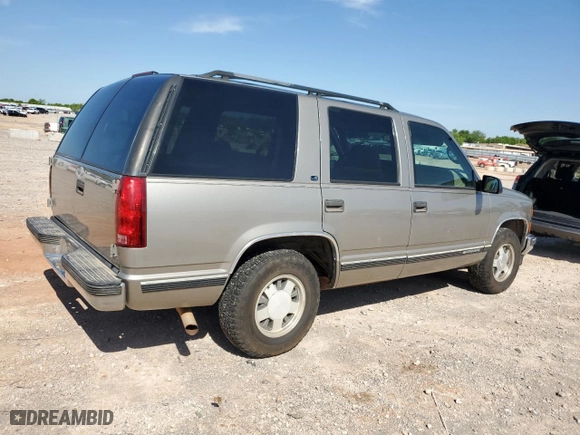 1999 Chevrolet Tahoe Limited with VIN 1GNEC13R5XR132083, listed as a Copart auction lot 54187405 with 167,548 mi miles and Clean Title. Bid and sale history available at carsss.com. Image 3.
