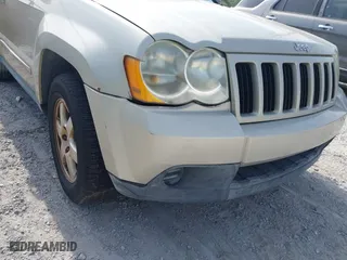2010 Jeep Grand Cherokee Laredo with VIN 1J4PS4GK6AC136702, listed as a IAAI auction lot 42066484 with 126,509 mi miles. Bid and sale history available at carsss.com. Image 6.