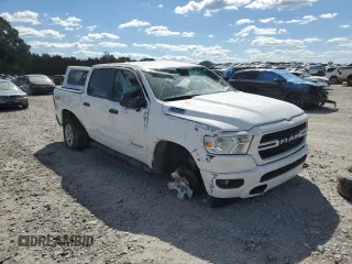 2022 Ram 1500 Tradesman with VIN 1C6SRFGT0NN269943, listed as a Copart auction lot 76373904 with 59,511 mi miles and Salvage title. Bid and sale history available at DreamBid. Image 4.