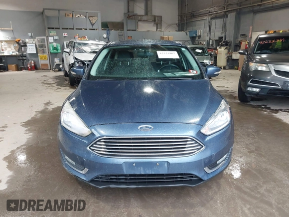 2018 Ford Focus Titanium with VIN 1FADP3N29JL242428, listed as a IAAI auction lot 42323967 with 200,662 mi miles and . Bid and sale history available at DreamBid. Image 12.