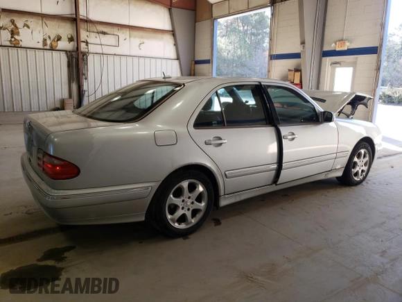 2002 Mercedes-Benz E-Class with VIN WDBJF65J12B499887, listed as a Copart auction lot 48708375 with 194,556 mi miles and Salvage Title. Bid and sale history available at carsss.com. Image 3.