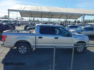 2015 Ford F-150 XLT with VIN 1FTEW1C8XFKE17196, listed as a IAAI auction lot 41414904 with 150,866 mi miles and . Bid and sale history available at carsss.com. Image 13.