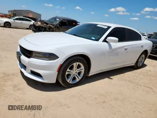 2019 Dodge Charger SXT with VIN 2C3CDXBG2KH754850, listed as a Copart auction lot 61244455 with 77,427 mi miles and Clean title. Bid and sale history available at DreamBid. Image 1.