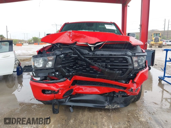 2022 Ram 1500 Big Horn z VIN 1C6RRFBG7NN220702, wystawiony jako IAAI lot #42244874 z przebiegiem 39 799 mil mil oraz . Historia ofert i sprzedaży dostępna na DreamBid. Obrazek 6.