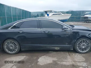 2014 Lincoln MKZ Hybrid with VIN 3LN6L2LU3ER805389, listed as a IAAI auction lot 42000901 with 155,002 mi miles and . Bid and sale history available at carsss.com. Image 13.