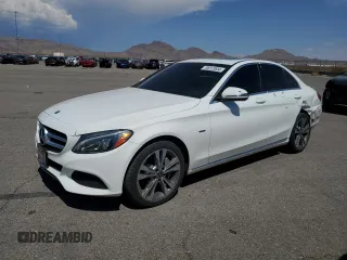 2018 Mercedes-Benz C 350e with VIN 55SWF4HB4JU243060, listed as a Copart auction lot 70012004 with 51,688 mi miles and Salvage title. Bid and sale history available at DreamBid. Image 1.