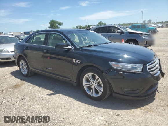 2014 Ford Taurus SEL z VIN 1FAHP2E81EG127398, wystawiony jako Copart lot #56666105 z przebiegiem 96 693 mil mil oraz Szkoda całkowita • Salvage title. Historia ofert i sprzedaży dostępna na DreamBid. Obrazek 4.