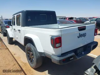 2023 Jeep Gladiator Overland with VIN 1C6HJTFG5PL523116, listed as a IAAI auction lot 42031287 with 1 mi miles. Bid and sale history available at carsss.com. Image 3.