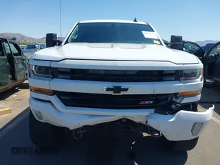 2016 Chevrolet Silverado 1500 LT with VIN 3GCUKREC5GG369915, listed as a IAAI auction lot 42082155 with 137,671 mi miles and . Bid and sale history available at DreamBid. Image 6.