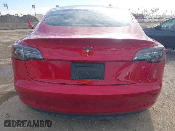 2020 Tesla Model 3 Standard Range Plus with VIN 5YJ3E1EA9LF718027, listed as a IAAI auction lot 41679320 with 68,987 mi miles. Bid and sale history available at carsss.com. Image 16.