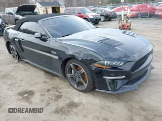 2021 Ford Mustang GT Premium with VIN 1FATP8FF4M5143096, listed as a IAAI auction lot 42013344 with 20,221 mi miles and . Bid and sale history available at DreamBid. Image 1.