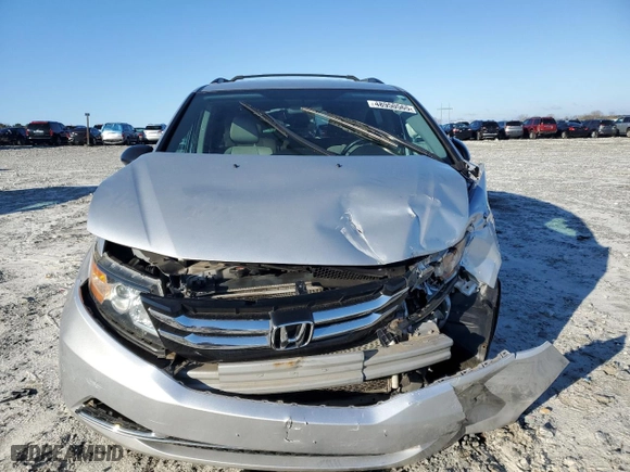 2014 Honda Odyssey LX with VIN 5FNRL5H27EB039999, listed as a Copart auction lot 48950565 with 121,740 mi miles and Salvage Title. Bid and sale history available at carsss.com. Image 5.