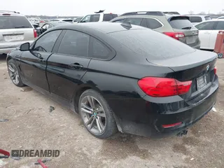 2015 BMW 4 Series 428i with VIN WBA4A9C54FD416870, listed as a IAAI auction lot 41593977 with 99,314 mi miles and . Bid and sale history available at DreamBid. Image 3.