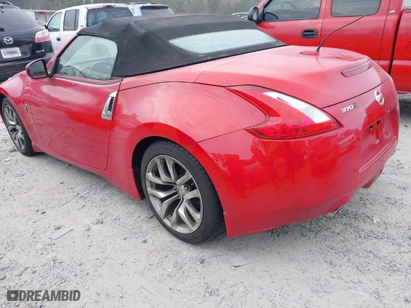2010 Nissan 370Z Touring with VIN JN1AZ4FH8AM302891, listed as a IAAI auction lot 41384656 with 148,833 mi miles. Bid and sale history available at carsss.com. Image 3.
