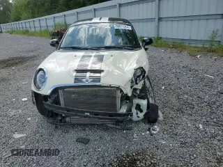 2012 MINI Coupe S z VIN WMWSX3C56CT154872, wystawiony jako Copart lot #68011264 z przebiegiem 91 650 mil mil oraz Szkody całkowita. Historia ofert i sprzedaży dostępna na DreamBid. Obrazek 10.